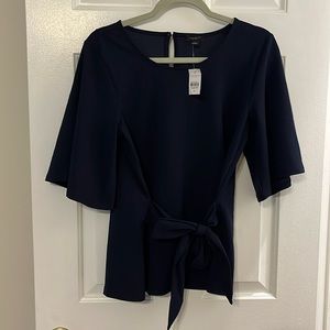 NWT Ann Taylor Factory medium sized navy top with adjustable tie!